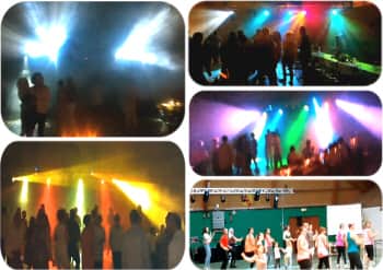 plusieurs personnes dansent et font la fete sous des jeux de lumiere